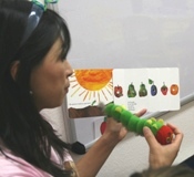 Miss Tracy During Hungry Catepillar Story Time