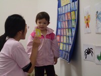 Mandarin for Kids:  2 year old girl at calendar